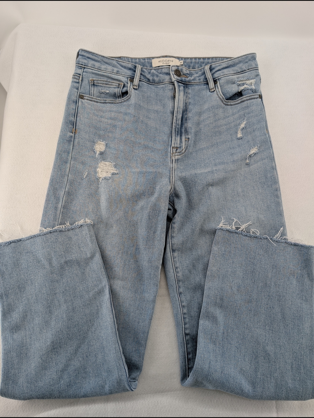 HIDDEN brand light wash distressed denim jeans featuring a straight-leg cut